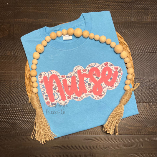 Nurse Outline Embroidered Appliqué Garment - Adult